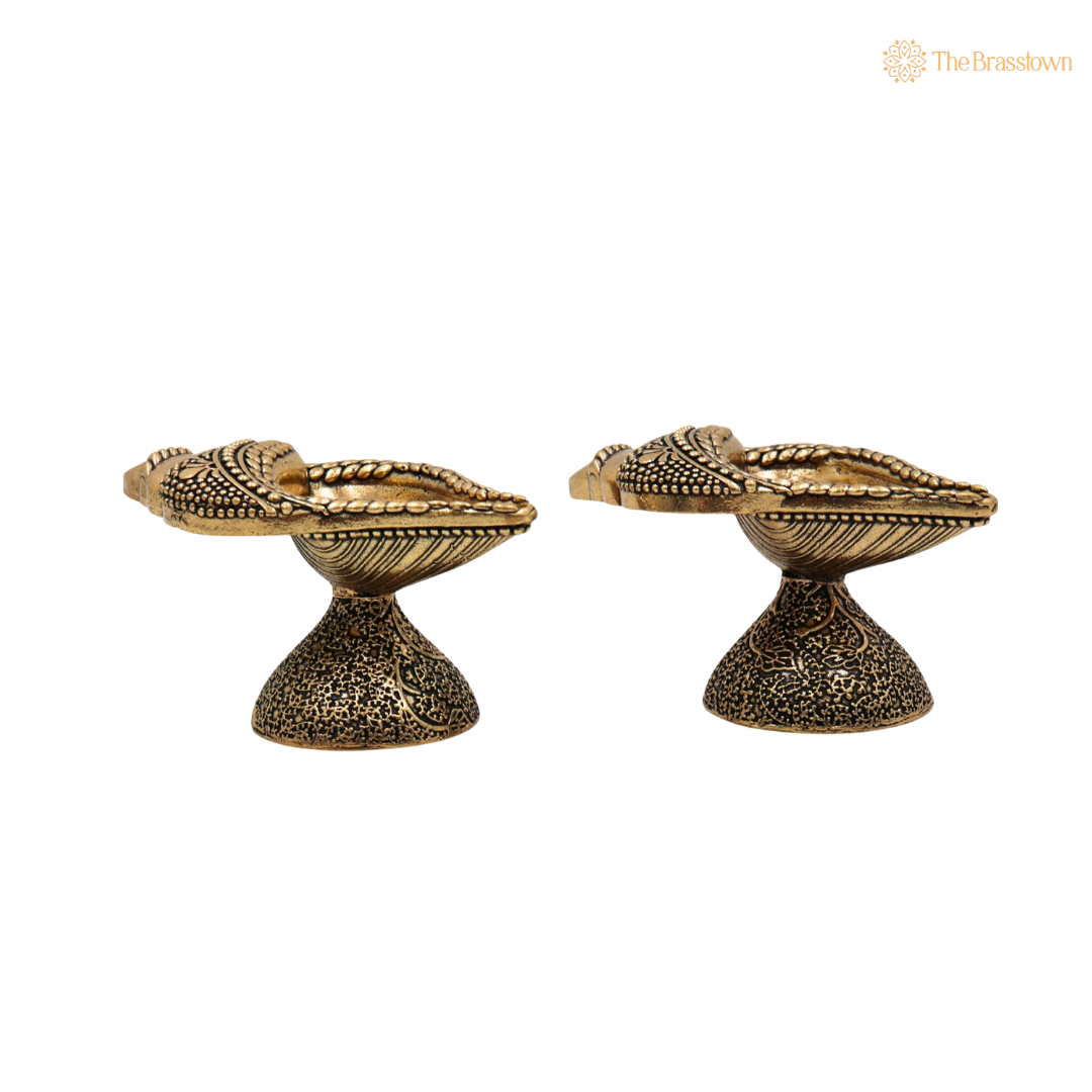 Brass Handcrafted Shankha Diya – Conch Shape Oil Lamp (Peetal Deepak) for Puja, Aarti & Home Mandir Décor 1.5 Inch (set of 2)