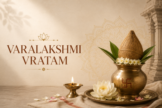 Brass Lakshmi idol puja setup for Varalakshmi Vratam at home — diya flowers and thali arrangement