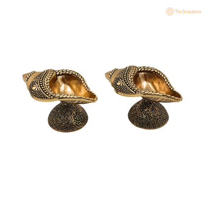 Brass Handcrafted Shankha Diya – Conch Shape Oil Lamp (Peetal Deepak) for Puja, Aarti &amp; Home Mandir Décor 1.5 Inch (set of 2)
