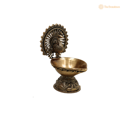 Brass Superfine Designer Peacock Diya 4 Inch closeup – intricate craftsmanship