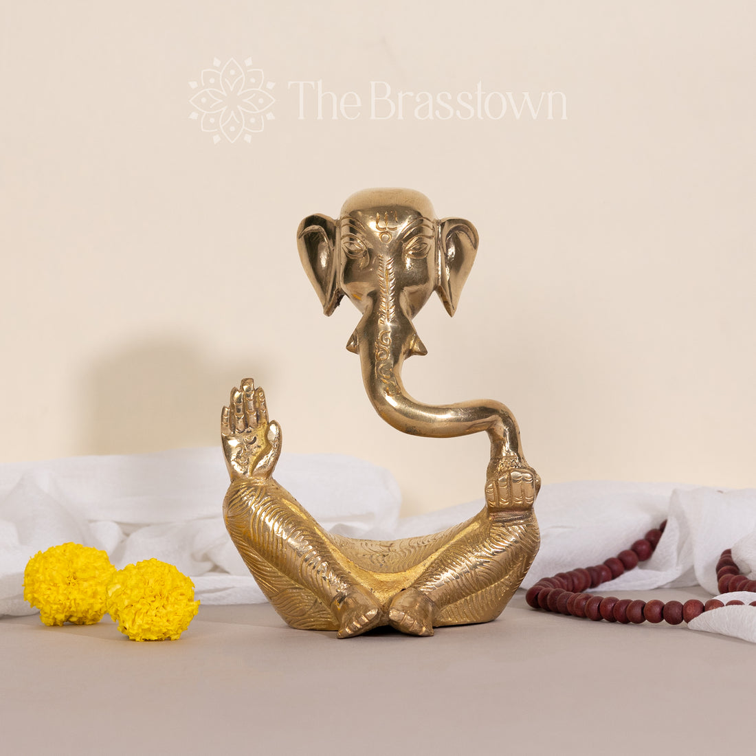 Golden Brass Ganesha in a Meditative Pose – Handcrafted Sculpture for Home Decor