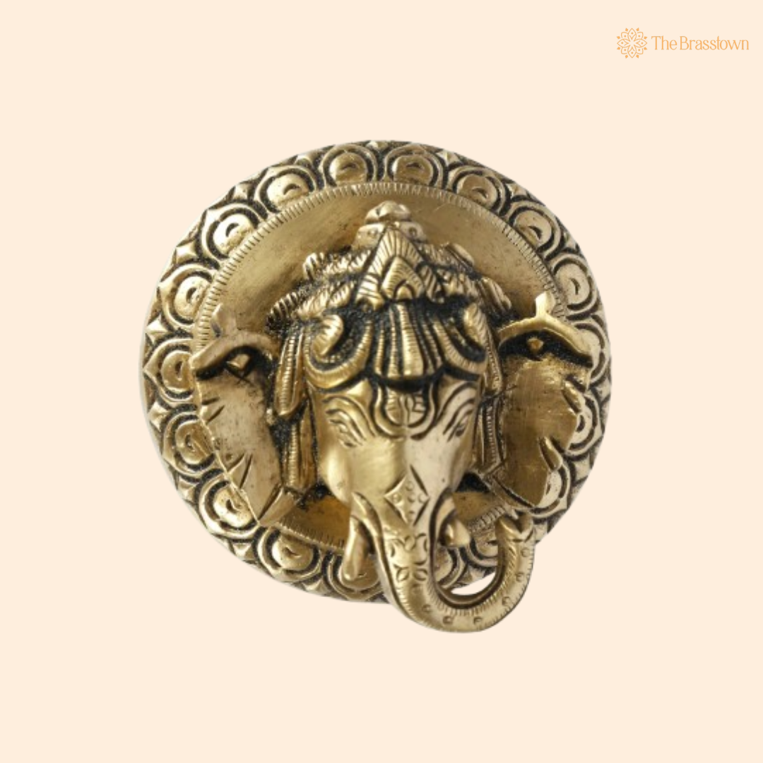 Brass Ganesha Head Idol – Elegant and Divine Craftsmanship 3 Inch