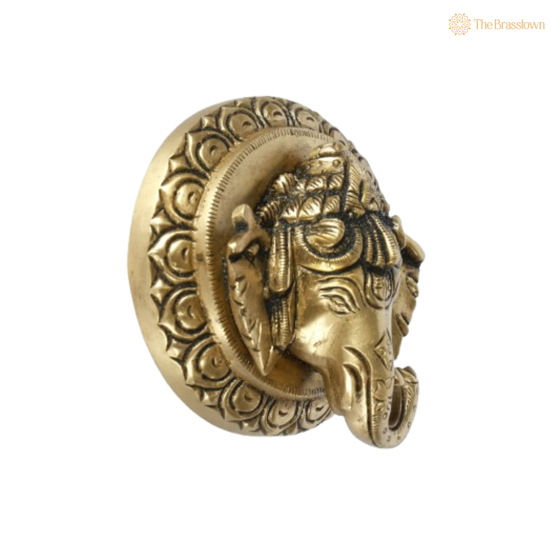 Brass Ganesha Head Idol – Elegant and Divine Craftsmanship 3 Inch