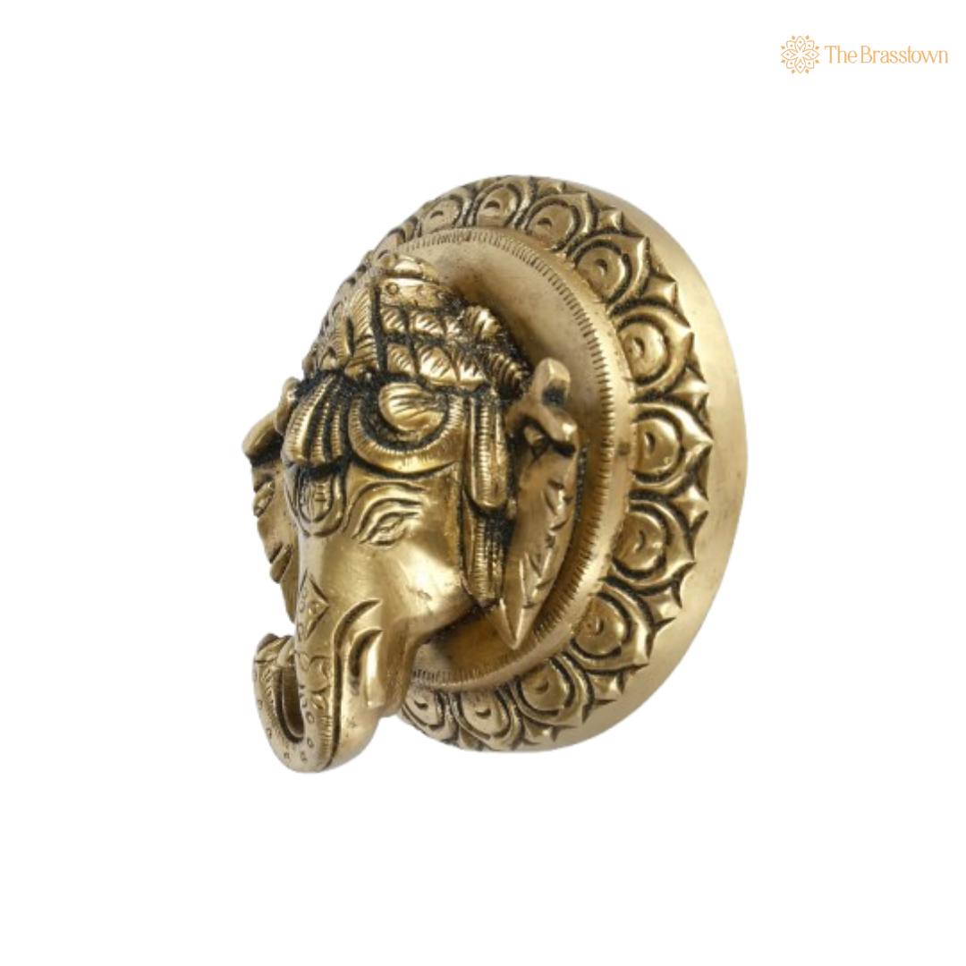 Brass Ganesha Head Idol – Elegant and Divine Craftsmanship 3 Inch