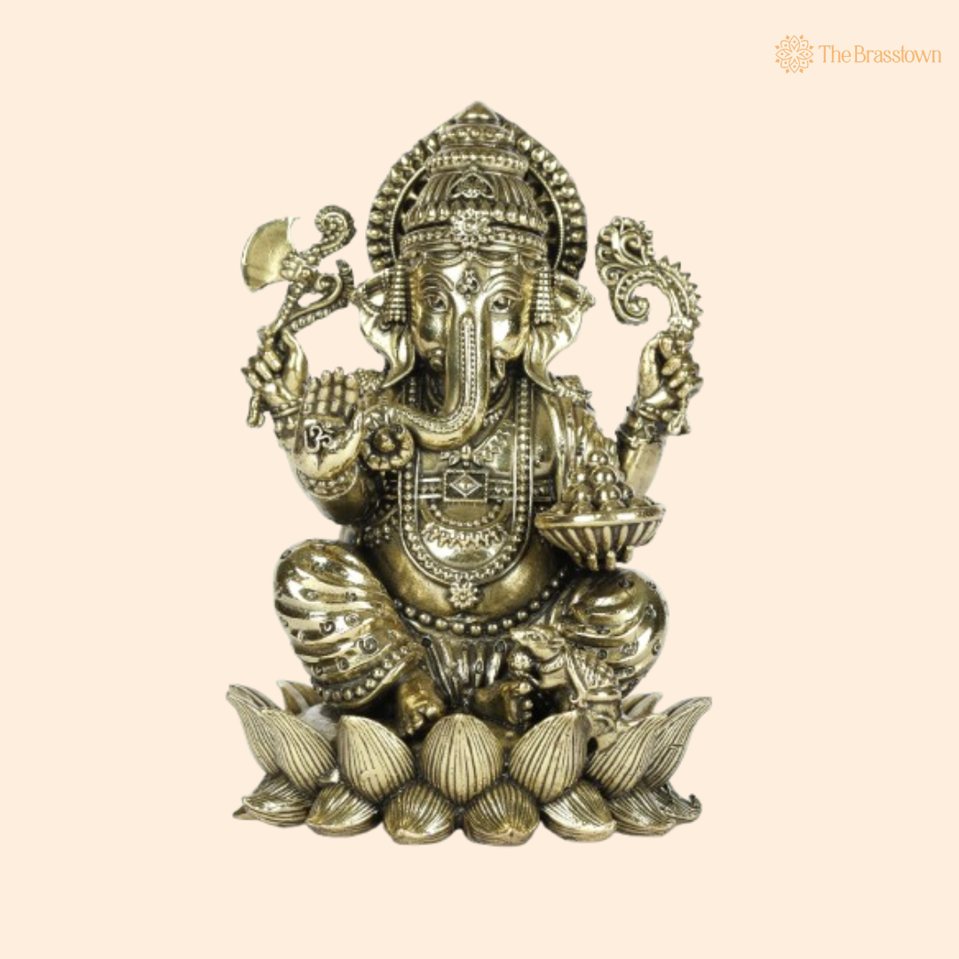 Brass Ganesha Idol Seated on Coconut Base 4 Inch