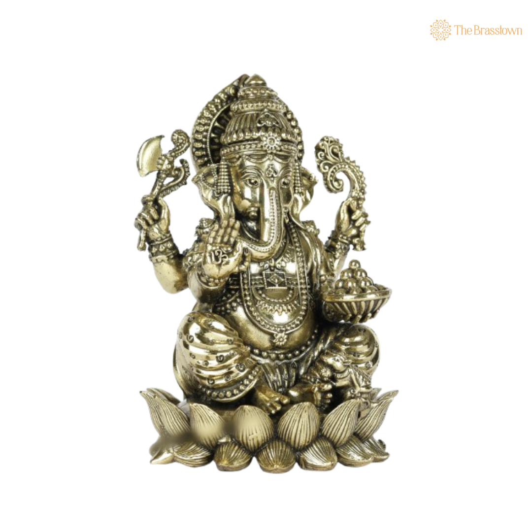 Brass Ganesha Idol Seated on Coconut Base 4 Inch