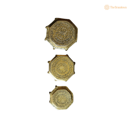 Set of Handcrafted Brass Pooja closeup – intricate craftsmanship